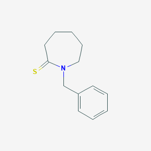 molecular formula C13H17NS B102896 1-Benzylazepane-2-thione CAS No. 17642-90-9