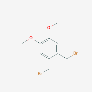 molecular formula C10H12Br2O2 B104289 1,2-Bis(bromomethyl)-4,5-dimethoxybenzene CAS No. 26726-81-8