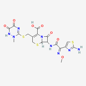 molecular formula C18H18N8O7S3 B10753510 (6R)-7-[[(2E)-2-(2-amino-1,3-thiazol-4-yl)-2-methoxyiminoacetyl]amino]-3-[(2-methyl-5,6-dioxo-1H-1,2,4-triazin-3-yl)sulfanylmethyl]-8-oxo-5-thia-1-azabicyclo[4.2.0]oct-2-ene-2-carboxylic acid 