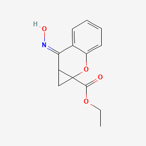 molecular formula C13H13NO4 B10763491 ethyl (7Z)-7-hydroxyimino-1,7a-dihydrocyclopropa[b]chromene-1a-carboxylate 