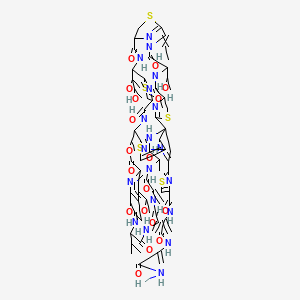 molecular formula C71H81N19O18S5 B10766333 N-[3-[(3-amino-3-oxoprop-1-en-2-yl)amino]-3-oxoprop-1-en-2-yl]-2-[(1S)-18-[(2S)-2,3-dihydroxybutan-2-yl]-11-ethylidene-59-hydroxy-8,31-bis(1-hydroxyethyl)-26,46-dimethyl-40,43-dimethylidene-6,9,16,23,28,38,41,44,47-nonaoxo-37-propan-2-yl-27-oxa-3,13,20,56-tetrathia-7,10,17,24,36,39,42,45,48,52,58,61,62,63,64-pentadecazanonacyclo[23.23.9.329,35.12,5.112,15.119,22.154,57.01,53.032,60]tetrahexaconta-2(64),4,12(63),19(62),21,29(61),30,32(60),33,51,54,57-dodecaen-51-yl]-1,3-thiazole-4-carboxamide 