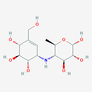 molecular formula C13H23NO8 B10778150 4,6-dideoxy-4-{[(1S,4R,5S,6S)-4,5,6-trihydroxy-3-(hydroxymethyl)cyclohex-2-en-1-yl]amino}-alpha-D-glucopyranose 