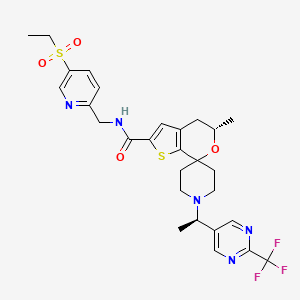 molecular formula C28H32F3N5O4S2 B10837056 (S)-N-((5-(Ethylsulfonyl)pyridin-2-YL)methyl)-5'-methyl-1-((R)-1-(2-(trifluoromethyl)pyrimidin-5-YL)ethyl)-4',5'-dihydrospiro[piperidine-4,7'-thieno[2,3-C]pyran]-2'-carboxamide 
