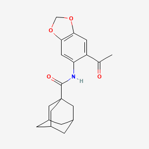 molecular formula C20H23NO4 B10901129 N~1~-(6-Acetyl-1,3-benzodioxol-5-YL)-1-adamantanecarboxamide 