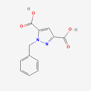 molecular formula C12H10N2O4 B10912751 1-Benzyl-1H-pyrazole-3,5-dicarboxylic acid 