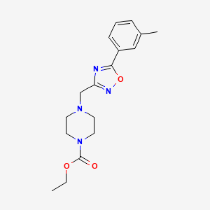molecular formula C17H22N4O3 B11200248 Ethyl 4-((5-m-tolyl-1,2,4-oxadiazol-3-yl)methyl)piperazine-1-carboxylate 