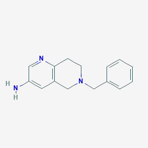 molecular formula C15H17N3 B112287 6-Benzyl-5,6,7,8-tetrahydro-1,6-naphthyridin-3-amine CAS No. 214699-26-0