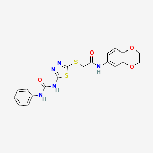 molecular formula C19H17N5O4S2 B11248356 N-(2,3-dihydrobenzo[b][1,4]dioxin-6-yl)-2-((5-(3-phenylureido)-1,3,4-thiadiazol-2-yl)thio)acetamide 