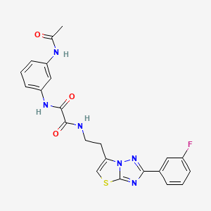 molecular formula C22H19FN6O3S B11257184 N1-(3-acetamidophenyl)-N2-(2-(2-(3-fluorophenyl)thiazolo[3,2-b][1,2,4]triazol-6-yl)ethyl)oxalamide 