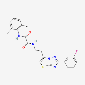 molecular formula C22H20FN5O2S B11260581 N1-(2,6-dimethylphenyl)-N2-(2-(2-(3-fluorophenyl)thiazolo[3,2-b][1,2,4]triazol-6-yl)ethyl)oxalamide 