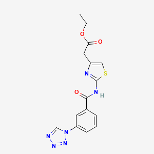 molecular formula C15H14N6O3S B11299570 ethyl (2-{[3-(1H-tetrazol-1-yl)benzoyl]amino}-1,3-thiazol-4-yl)acetate 