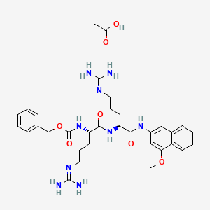 Acetic acid;benzyl N-[(2S)-5-(diaminomethylideneamino)-1-[[(2S)-5-(diaminomethylideneamino)-1-[(4-methoxynaphthalen-2-yl)amino]-1-oxopentan-2-yl]amino]-1-oxopentan-2-yl]carbamate