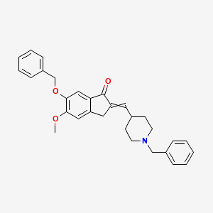 molecular formula C₃₀H₃₁NO₃ B1140796 1-Benzyl-4-[(6-benzyloxy-5-methoxy-1-indanone)-2-ylidenyl methylpiperidine CAS No. 1076198-90-7