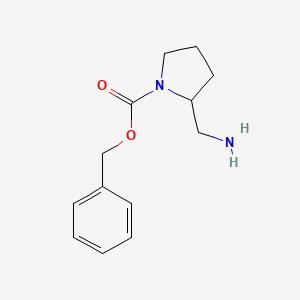 B1142058 Benzyl 2-(aminomethyl)pyrrolidine-1-carboxylate CAS No. 119020-03-0