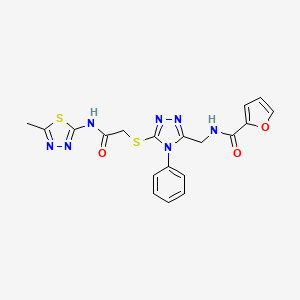 molecular formula C19H17N7O3S2 B11423532 N-{[5-({[(5-Methyl-1,3,4-thiadiazol-2-YL)carbamoyl]methyl}sulfanyl)-4-phenyl-4H-1,2,4-triazol-3-YL]methyl}furan-2-carboxamide 