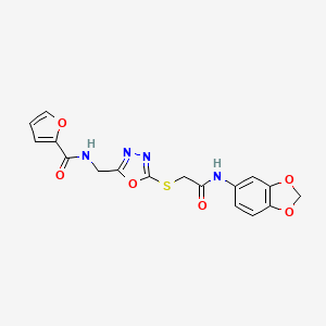 molecular formula C17H14N4O6S B11427199 N-((5-((2-(benzo[d][1,3]dioxol-5-ylamino)-2-oxoethyl)thio)-1,3,4-oxadiazol-2-yl)methyl)furan-2-carboxamide 