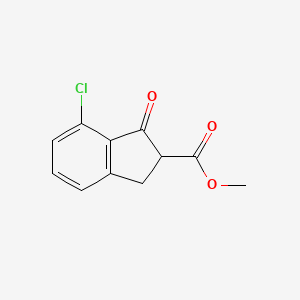 Methyl 7-chloro-1-oxo-2,3-dihydro-1H-indene-2-carboxylate