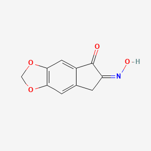 B1146440 6-(Hydroxyimino)-6,7-dihydro-5H-indeno[5,6-d][1,3]dioxol-5-one CAS No. 38489-93-9