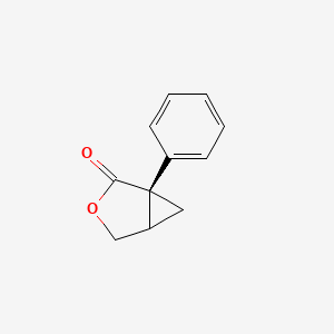 B1146967 3-Oxabicyclo[3.1.0]hexan-2-one, 1-phenyl-, (1R)- CAS No. 96847-52-8