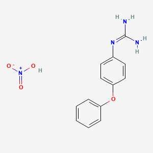 B1149145 1-(4-Phenoxyphenyl)guanidine nitrate CAS No. 105901-53-9