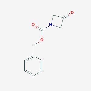 molecular formula C11H11NO3 B011546 3-氧代氮杂环丁烷-1-甲酸苄酯 CAS No. 105258-93-3