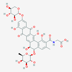 molecular formula C37H37NO19 B116521 Glycine, N-((5-((6-deoxy-beta-D-galactopyranosyl)oxy)-5,6,8,13-tetrahydro-1,6,9,14-tetrahydroxy-3-methyl-8,13-dioxo-11-(beta-L-xylopyranosyloxy)benzo(a)naphthacen-2-yl)carbonyl)-, (5S-trans)- CAS No. 149598-63-0