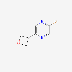 molecular formula C7H7BrN2O B11714073 2-Bromo-5-(oxetan-3-yl)pyrazine 