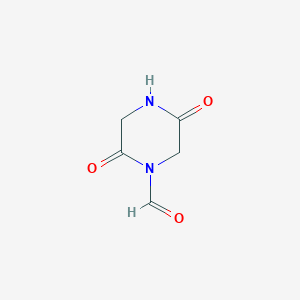 molecular formula C5H6N2O3 B117175 2,5-Dioxopiperazine-1-carbaldehyde CAS No. 143411-81-8