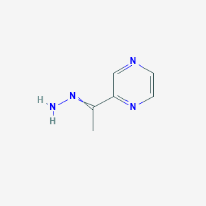molecular formula C6H8N4 B11719664 2-[1-(2-Pyrazinyl)ethylidene]hydrazine 