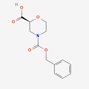 molecular formula C13H15NO5 B11753414 (2S)-4-[(Benzyloxy)carbonyl]morpholine-2-carboxylic acid CAS No. 1439373-47-3