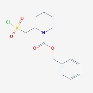 molecular formula C14H18ClNO4S B11796769 Benzyl 2-((chlorosulfonyl)methyl)piperidine-1-carboxylate 
