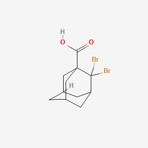2,2-Dibromo-1-adamantanecarboxylic acid