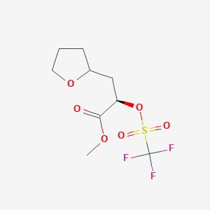 molecular formula C9H13F3O6S B11811863 (2R)-Methyl 3-(tetrahydrofuran-2-yl)-2-(((trifluoromethyl)sulfonyl)oxy)propanoate 