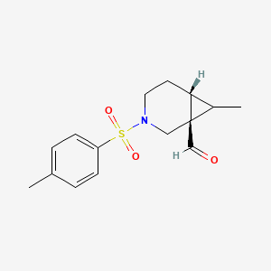molecular formula C15H19NO3S B11829794 (1R,6R)-7-Methyl-3-tosyl-3-azabicyclo[4.1.0]heptane-1-carbaldehyde 