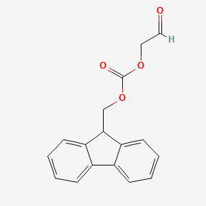 molecular formula C17H14O4 B11832158 Carbonic acid, 9H-fluoren-9-ylmethyl 2-oxoethyl ester 