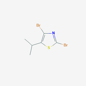 molecular formula C6H7Br2NS B11837791 2,4-Dibromo-5-isopropylthiazole 