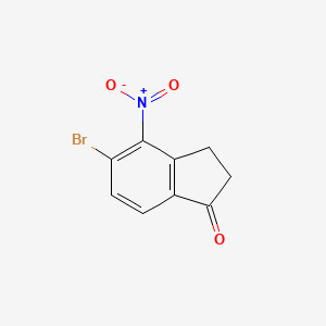 molecular formula C9H6BrNO3 B11856380 5-bromo-4-nitro-2,3-dihydro-1H-inden-1-one 