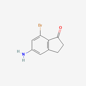 molecular formula C9H8BrNO B11882575 5-Amino-7-bromo-2,3-dihydro-1H-inden-1-one 