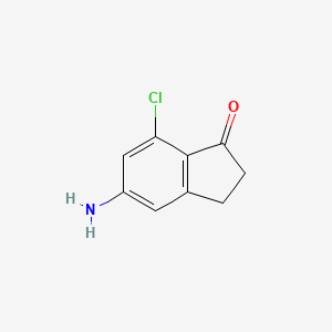 molecular formula C9H8ClNO B11908271 5-Amino-7-chloro-2,3-dihydroinden-1-one 