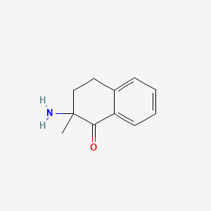 B1194311 2-Amino-2-methyl-1-tetralone CAS No. 96866-39-6
