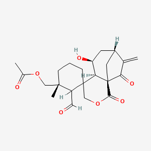 molecular formula C22H28O7 B1194482 [(3R,4a'R,5'S,7'R,9a'R)-2-Formyl-5'-hydroxy-3-methyl-8'-methylene-1',9'-dioxohexahydrospiro[cyclohexane-1,4'-[2]oxa[7,9a]methanocyclohepta[c]pyran]-3-yl]methyl acetate 