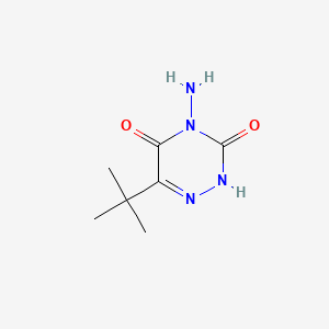 molecular formula C7H12N4O2 B1194530 1,2,4-三嗪-3,5(2H,4H)-二酮，4-氨基-6-(1,1-二甲基乙基)- CAS No. 56507-37-0