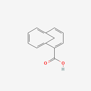 molecular formula C12H10O2 B11946471 Bicyclo[4.4.1]undeca-1,3,5,7,9-pentaene-2-carboxylic acid CAS No. 5873-56-3