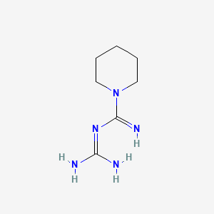 molecular formula C7H15N5 B1195973 N-[amino(imino)methyl]piperidine-1-carboximidamide CAS No. 4705-40-2