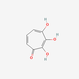 molecular formula C7H6O4 B1196482 3,7-二羟基茚满酮 CAS No. 85233-29-0