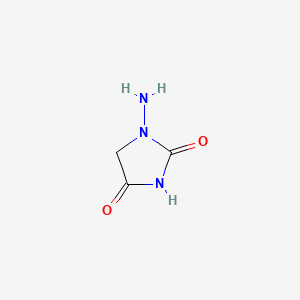 molecular formula C3H5N3O2 B1197227 1-Aminoimidazolidine-2,4-dione CAS No. 6301-02-6