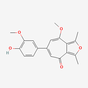molecular formula C19H18O5 B1197372 6-(4-hydroxy-3-methoxyphenyl)-8-methoxy-1,3-dimethyl-4H-cyclohepta[c]furan-4-one 