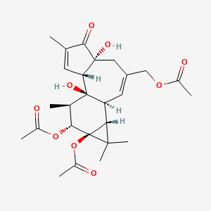 molecular formula C26H34O9 B1198075 Phorbol 12,13,20-triacetate 