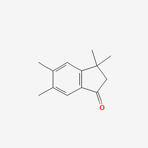 molecular formula C13H16O B1198165 3,3,5,6-Tetramethyl-1-indanone 