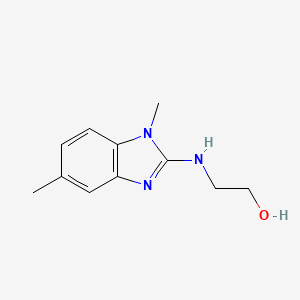 molecular formula C11H15N3O B1199572 2-[(1,5-Dimethyl-2-benzimidazolyl)amino]ethanol 